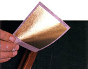 Applicazione oro imitazione in foglia a decalco